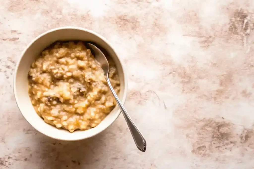 A bowl of mashed bananas for Banana Bread Without Baking Soda